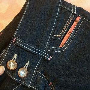 Navy skinny jeans with pink accents